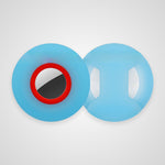 Two light blue circular plastic pieces, likely replacement wheels or components, shown on a light gray background. One piece features a red ring around a black and white segmented center.